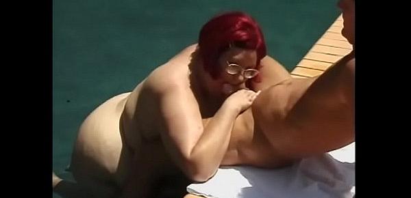  Heavy cream MILF Tia Davis with red as flame  hair makes the blind see and got her lusty mouth full of jizz sitting in the pool